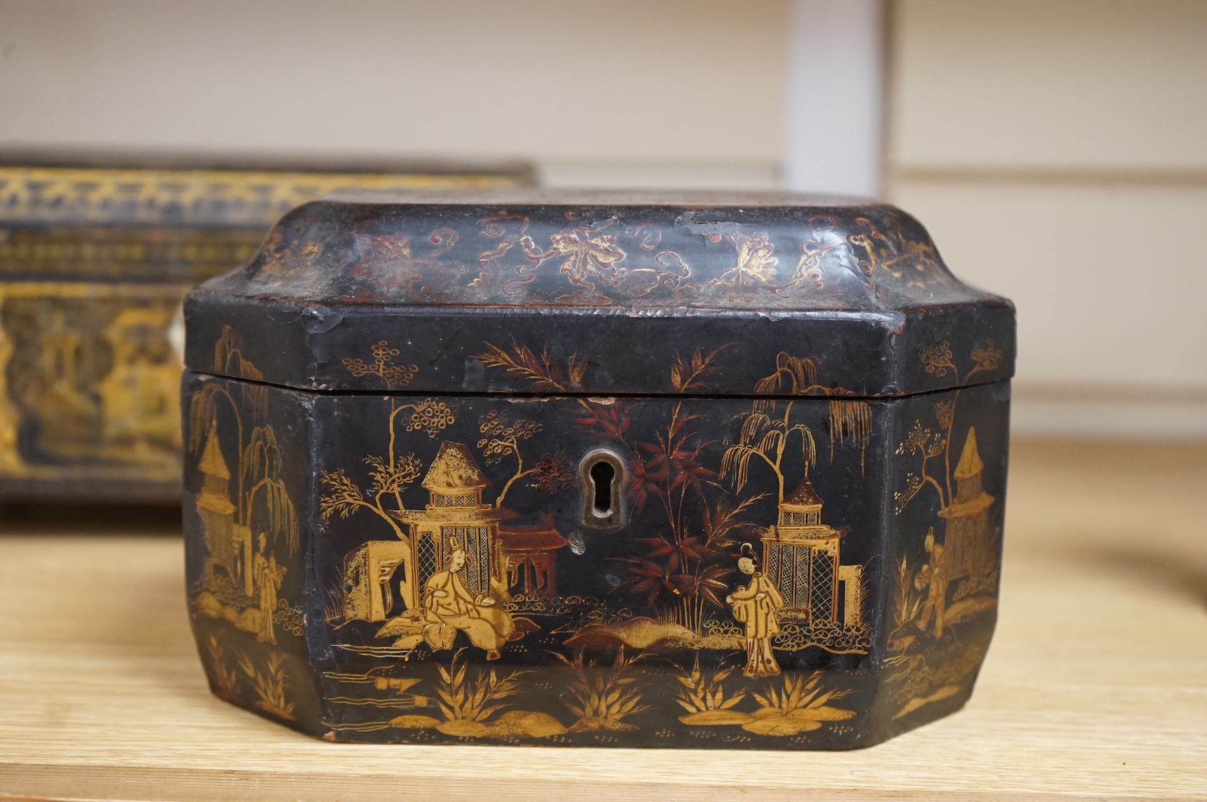 A Chinese lacquer tea caddy and a japanned sewing box (2)